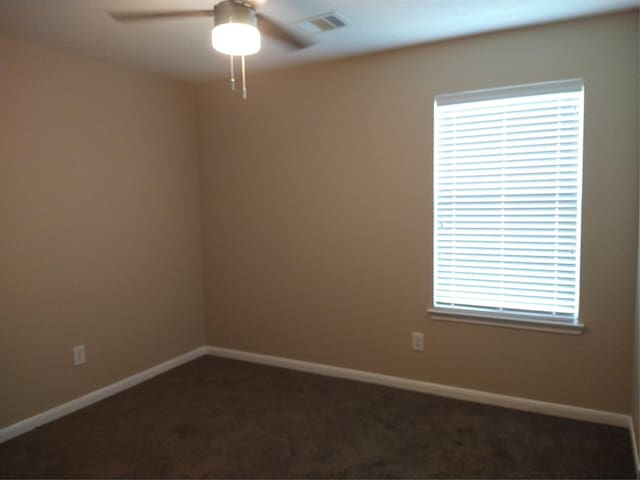 811 Sweet Flower Dr, Houston, TX 77073 - spare room featuring ceiling fan, healthy amount of natural light, and baseboards