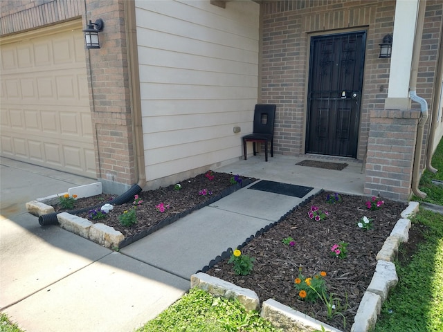 811 Sweet Flower Dr, Houston, TX 77073 - doorway to property with brick siding and an attached garage