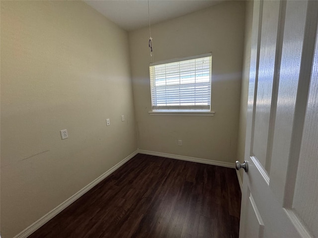13796 County Road 318, Navasota, TX 77868 - spare room with dark wood-type flooring and baseboards