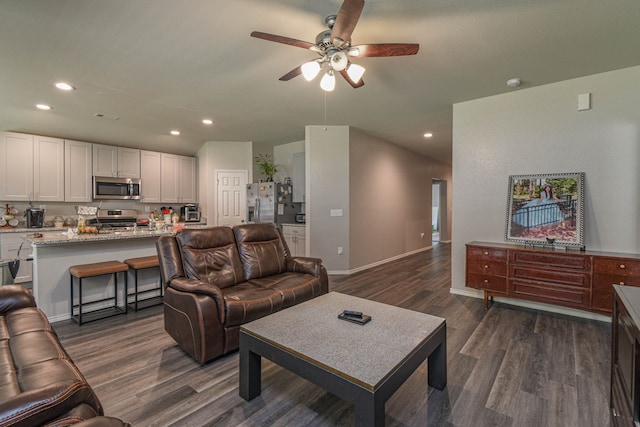 9971 Spring Creek Rd, Cleveland, TX 77327 - living area featuring recessed lighting, baseboards, a ceiling fan, and dark wood-style flooring