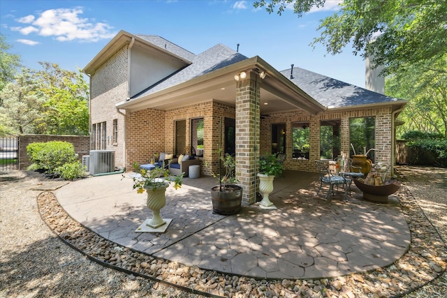 1302 Royal Sands Ln, Houston, TX 77345 - view of patio with central AC