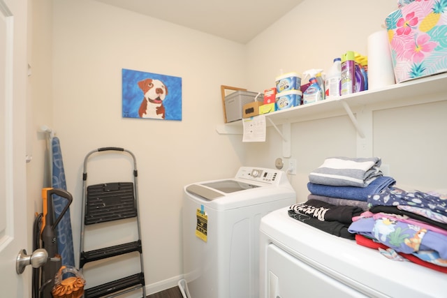 12626 Baker Bend St, Houston, TX 77034 - clothes washing area with washing machine and clothes dryer and laundry area