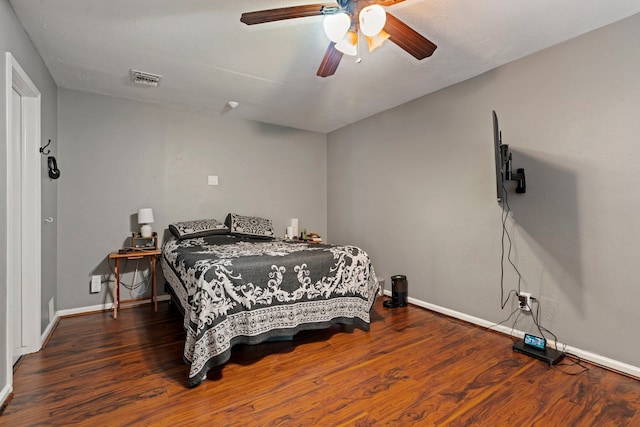 15110 Falling Creek Dr, Houston, TX 77068 - bedroom featuring baseboards, wood finished floors, and a ceiling fan