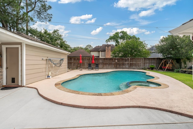 15110 Falling Creek Dr, Houston, TX 77068 - view of pool featuring a patio, a fenced backyard, and a pool with connected hot tub
