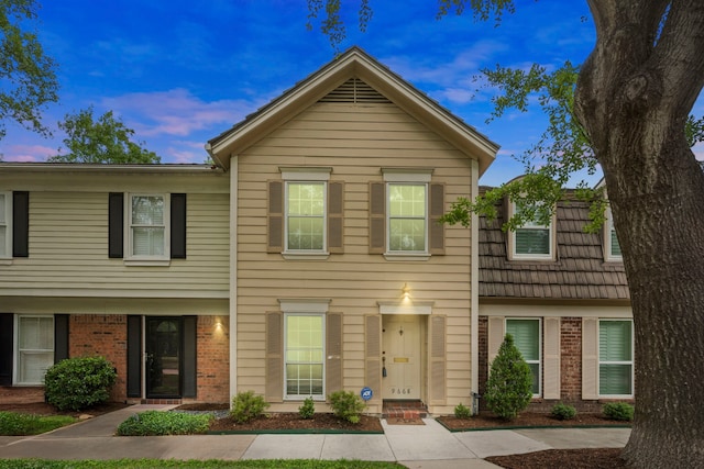 multi unit property featuring brick siding
