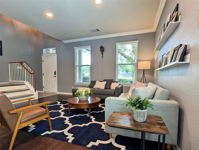 living room with visible vents, stairs, wood finished floors, ornamental molding, and recessed lighting