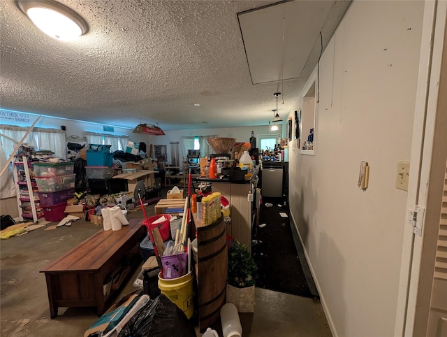 below grade area with a textured ceiling