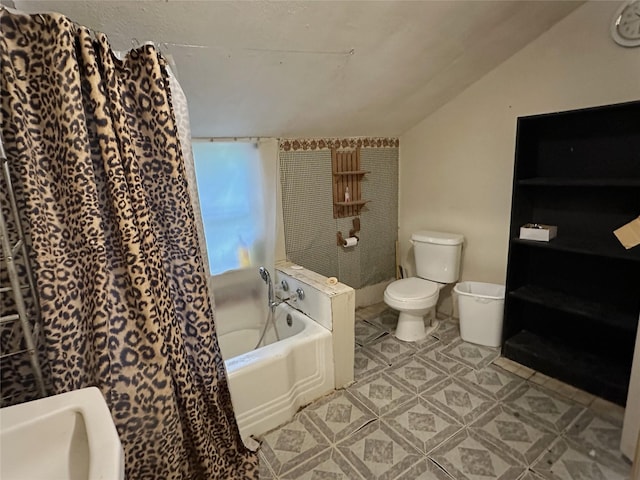 full bathroom featuring a garden tub and toilet