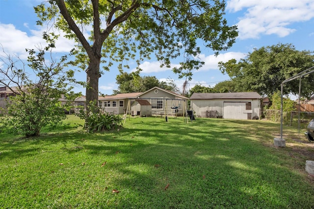 808 Morrell St, Baytown, TX 77520 - view of yard featuring fence and an outbuilding
