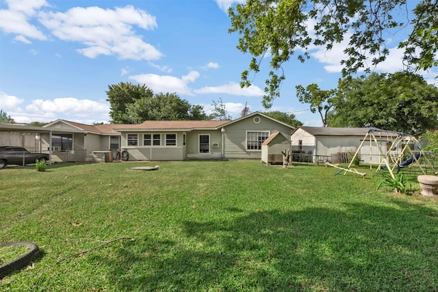 808 Morrell St, Baytown, TX 77520 - back of house featuring a yard