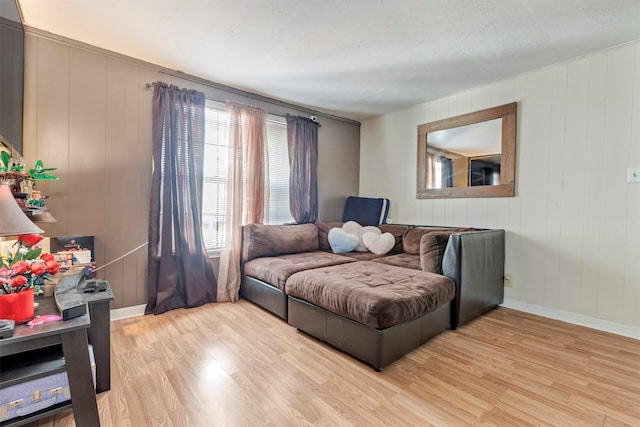 808 Morrell St, Baytown, TX 77520 - living area featuring baseboards and light wood-type flooring