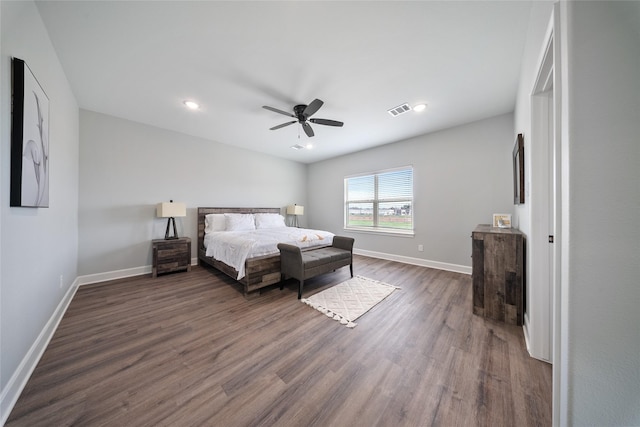 bedroom featuring ceiling fan, visible vents, baseboards, recessed lighting, and dark wood-type flooring