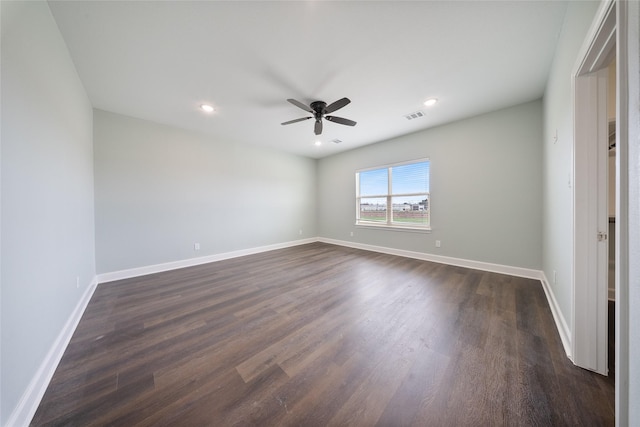 unfurnished bedroom featuring a ceiling fan, visible vents, dark wood finished floors, baseboards, and recessed lighting