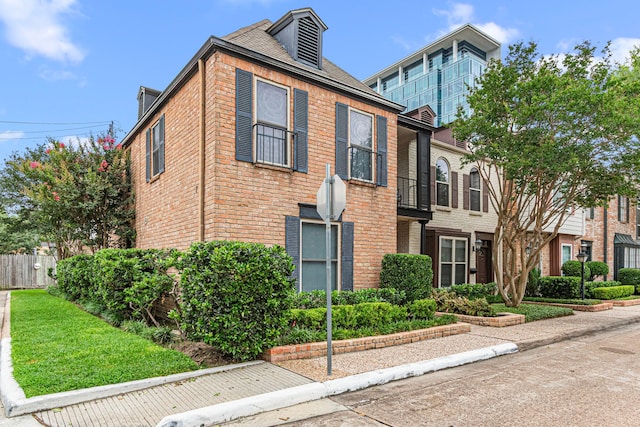 3749 Wakeforest St, Houston, TX 77098 - view of front facade featuring brick siding