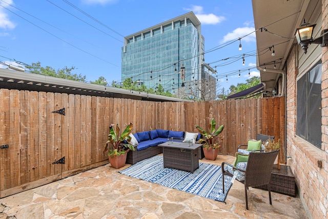 3749 Wakeforest St, Houston, TX 77098 - fenced backyard with a patio area and outdoor lounge area