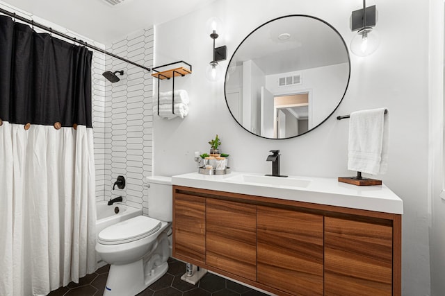 3749 Wakeforest St, Houston, TX 77098 - bathroom featuring vanity, tile patterned flooring, shower / bath combination with curtain, and toilet