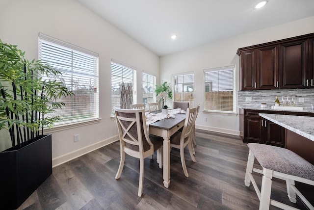 dining area with recessed lighting, baseboards, and dark wood-style floors