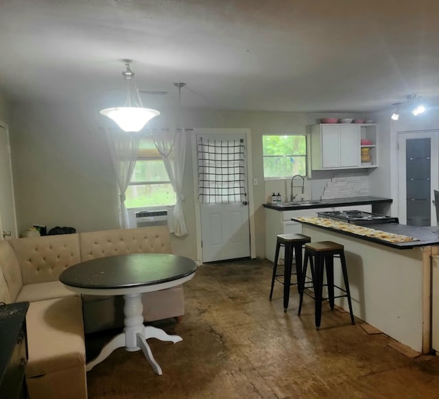 dining area featuring cooling unit