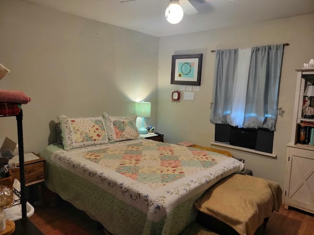 bedroom featuring ceiling fan and wood finished floors