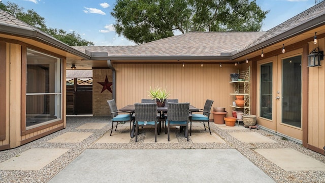 view of patio with french doors and outdoor dining space