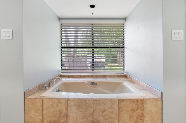 full bathroom featuring a garden tub