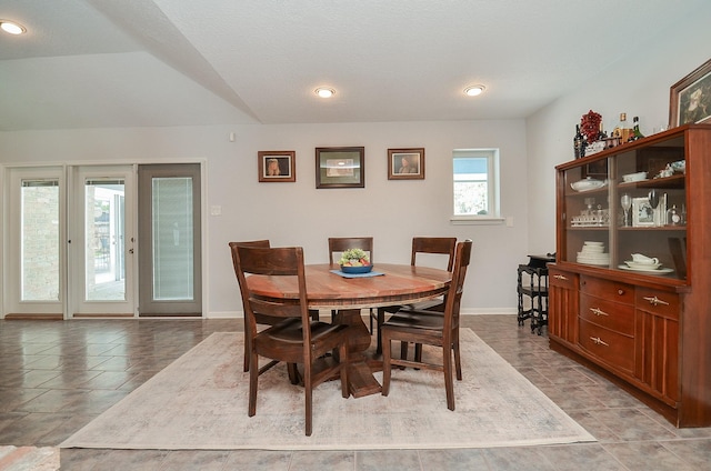 dining space featuring baseboards and recessed lighting