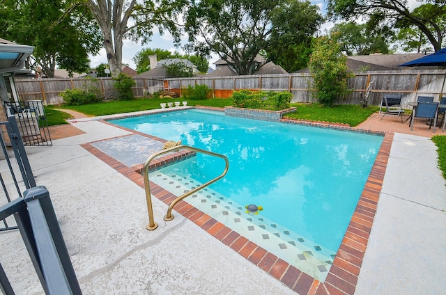 view of pool with a patio area