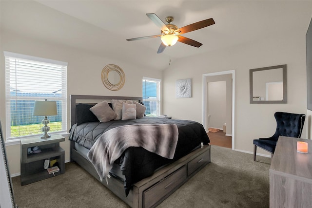 2415 Allendale Garden Ln, Spring, TX 77373 - carpeted bedroom featuring multiple windows, baseboards, ceiling fan, and vaulted ceiling