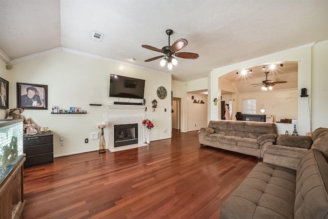 20319 Concord Hill Dr, Cypress, TX 77433 - living area with visible vents, a fireplace with flush hearth, ceiling fan, and wood finished floors
