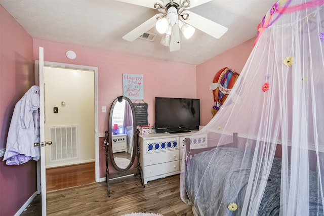 20319 Concord Hill Dr, Cypress, TX 77433 - bedroom featuring ceiling fan, baseboards, visible vents, and wood finished floors