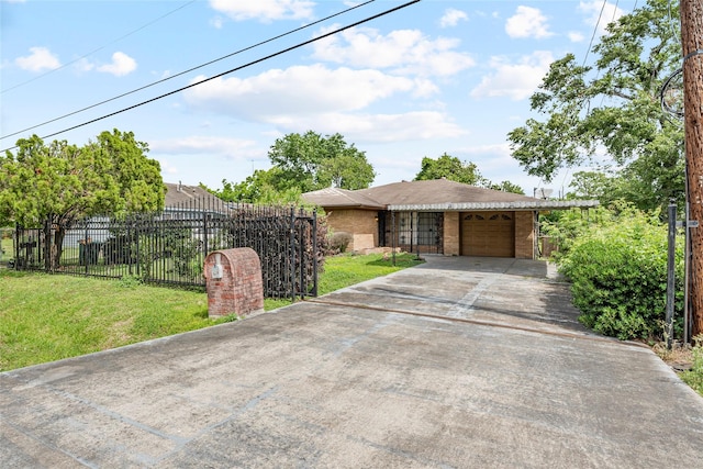 ranch-style home with brick siding, a front lawn, fence, and concrete driveway