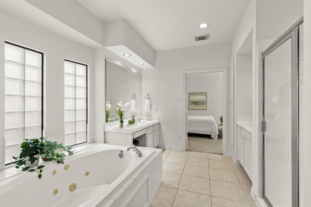 5514 Chase Hbr, Houston, TX 77041 - ensuite bathroom featuring a whirlpool tub, a shower stall, tile patterned floors, vanity, and recessed lighting