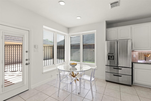 5514 Chase Hbr, Houston, TX 77041 - dining room with baseboards, light tile patterned flooring, and recessed lighting
