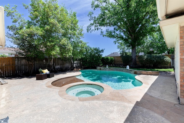 view of pool with an in ground hot tub, a fenced in pool, a fenced backyard, and a patio