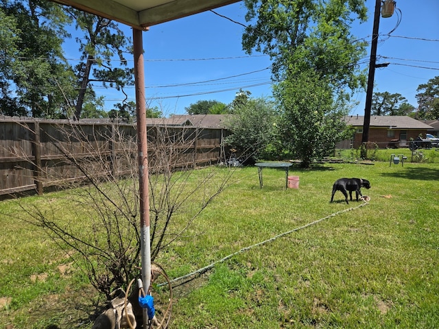 view of yard featuring fence