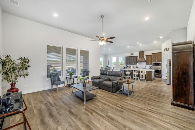 41015 Kimber Ln, Magnolia, TX 77354 - living room featuring visible vents, recessed lighting, light wood-style floors, and ceiling fan