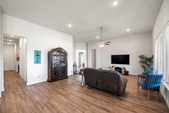 41015 Kimber Ln, Magnolia, TX 77354 - living room with recessed lighting, baseboards, ceiling fan, and light wood finished floors