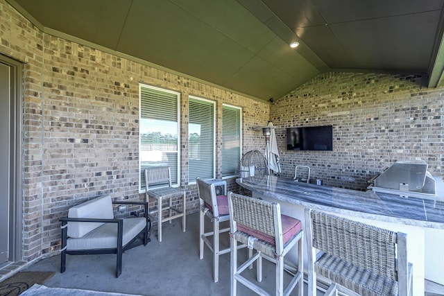 41015 Kimber Ln, Magnolia, TX 77354 - view of patio / terrace with exterior kitchen, outdoor wet bar, and a grill