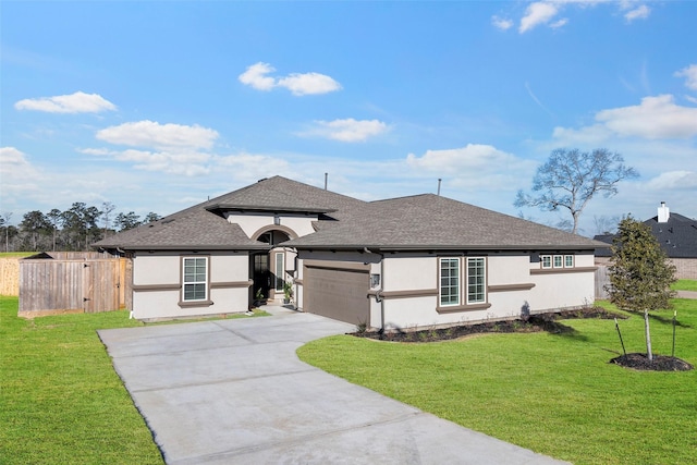 41015 Kimber Ln, Magnolia, TX 77354 - view of front of property featuring roof with shingles, an attached garage, stucco siding, a front yard, and concrete driveway