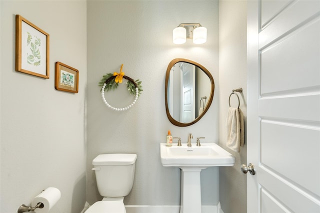 12 Caravelle Ct, Galveston, TX 77554 - bathroom featuring toilet