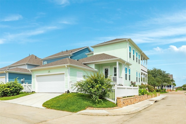 12 Caravelle Ct, Galveston, TX 77554 - view of side of property with an attached garage, driveway, covered porch, and roof with shingles