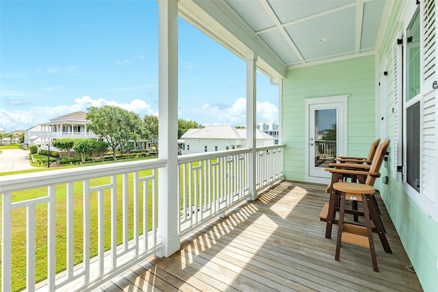 12 Caravelle Ct, Galveston, TX 77554 - wooden terrace with a residential view and a yard