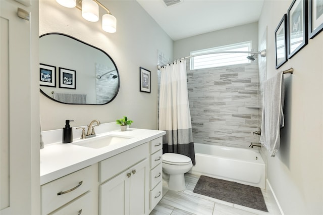 12 Caravelle Ct, Galveston, TX 77554 - bathroom featuring vanity, shower / bath combo with shower curtain, and toilet