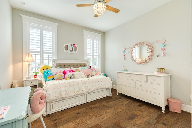 12 Caravelle Ct, Galveston, TX 77554 - bedroom with dark wood-style floors and a ceiling fan