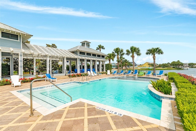 12 Caravelle Ct, Galveston, TX 77554 - community pool featuring a patio and a pergola