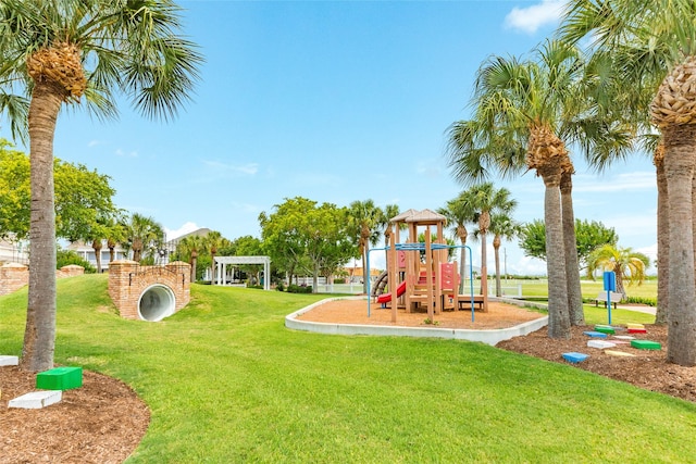 12 Caravelle Ct, Galveston, TX 77554 - community play area with a yard and a pergola