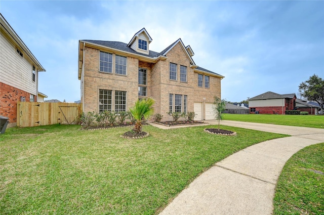 traditional home with driveway, a gate, brick siding, fence, and an attached garage