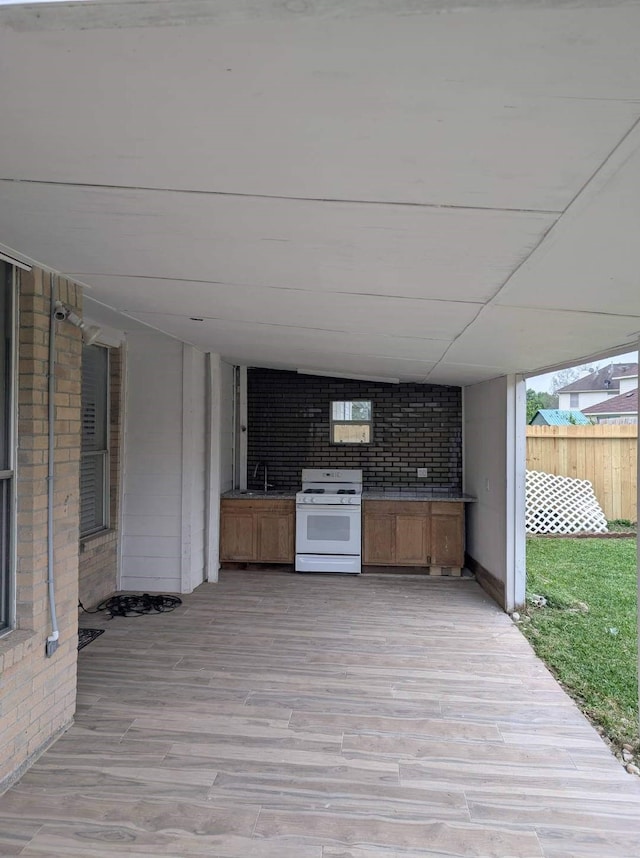 11906 Dinosaur Valley Dr, Sugar Land, TX 77498 - wooden deck with exterior kitchen and a sink