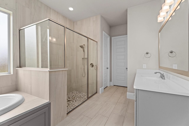 19506 Timberlake Glen Trl, Cypress, TX 77433 - bathroom with vanity, recessed lighting, baseboards, and a stall shower