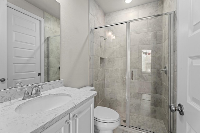 19506 Timberlake Glen Trl, Cypress, TX 77433 - full bathroom with vanity, a shower stall, and toilet